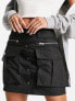 Фото #1 товара River Island utility mini skirt in black