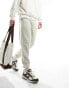 Фото #1 товара ASOS DESIGN tapered joggers in light beige