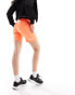 The North Face Training Mountain Athletic bootie shorts in bright orange