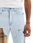 Фото #10 товара Karl Kani straight leg denim jeans in lightwash blue with check patches