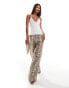 Fashionkilla slinky double layered wrap halterneck top with lace trim in off white