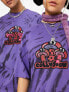 COLLUSION Unisex – T-Shirt in Lila mit Batikmuster und Pilz-Print