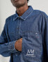 Lee x Jean-Michael Basquiat capsule back artwork print overhead worker denim shirt in mid wash