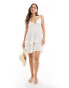 Фото #1 товара Miss Selfridge beach tie detail flippy mini dress in cream