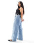 Фото #9 товара ASOS DESIGN Curve mid rise baggy boyfriend jeans in mid blue