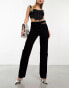 Фото #1 товара ASOS DESIGN mid rise straight jean with cut out waistband in washed black