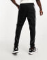 adidas Football Tiro tracksuit joggers in black