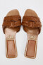 BRAIDED LEATHER FLAT SANDALS