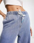 Urban Revivo wide leg jeans with tie waist detail in blue