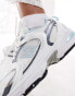 New Balance 530 trainers in white and light blue