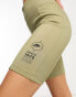 Nike Sport Utility rib legging shorts in neutral olive