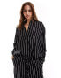 Фото #1 товара ASOS DESIGN relaxed shirt with linen in black stripe