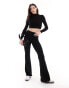 Фото #1 товара Bershka knitted wide leg trousers in black marl