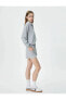 Фото #8 товара Джинсовые шорты Koton модель 4sak70039ek для женщин