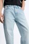 Зауженные джинсы с эффектом потертости ZARA