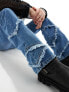 Фото #3 товара ASOS DESIGN flare jeans with raw edges in mid blue