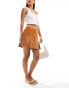 ASOS DESIGN faux leather woven mix pleated mini skirt in tan