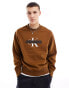 Фото #2 товара Calvin Klein Jeans monogram logo stencil crew neck sweatshirt in brown