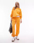 Topshop – Oversize-Jogginghose in oranger Vintage-Waschung mit „NYC Project“-Schaumprint, Kombiteil