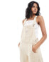 Фото #2 товара Levi's vintage fit stripe denim dungarees in white and cream