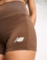 New Balance Linear Heritage high waisted 5'' booty shorts in dark brown