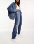 Фото #4 товара Levi's low rise ripped knee jeans in mid blue