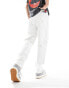 Фото #2 товара Tommy Jeans skater jeans in white