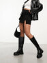 Фото #2 товара Stradivarius mini skirt with split hem in black