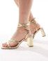 ASOS DESIGN Hampstead mid heeled sandals in gold