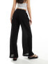 Bershka crinkle wide leg trousers in black