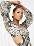 ASOS DESIGN Petite long sleeve cut out mini dress in leopard print
