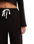 Фото #6 товара In The Style contrast drawstring waist wide leg side stripe trousers co-ord in black