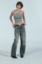 BUCKLED WASHED-EFFECT RIBBED TOP