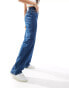 Фото #5 товара Calvin Klein Jeans high rise relaxed jean in mid wash