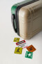 Customisable dinosaur suitcase