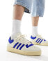 adidas Originals Rivalry Low trainers in white and blue