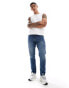 Фото #1 товара ASOS DESIGN slim fit jeans in mid wash blue