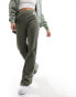 Фото #2 товара Calvin Klein Jeans woven label straight leg pants in olive