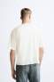 T-shirt with buttoned neck