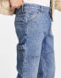 ASOS DESIGN — Schmal zulaufende Carpenter-Jeans in hellblauer Waschung