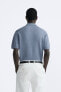 Textured knit polo shirt