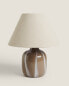 Table lamp with glass base