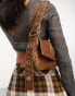 ASOS DESIGN washed shoulder bag with eyelet strap in tan