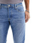 Фото #10 товара Jack & Jones glenn slim tapered fit jeans in mid blue wash