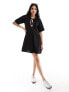 ASOS DESIGN waffle tie front smock mini dress in black