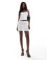 Kaiia pointelle ribbed contrast trim bow detail mini skirt co-ord in white