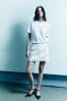 Фото #5 товара Короткая юбка в клетку с цветочным принтом — zw collection ZARA