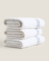 Stitched border cotton towel