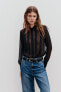Semi-sheer shirt with lace trims