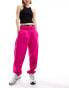 Nike mini swoosh oversized fleece joggers in pink - BPINK